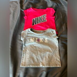 2 Nike shirts